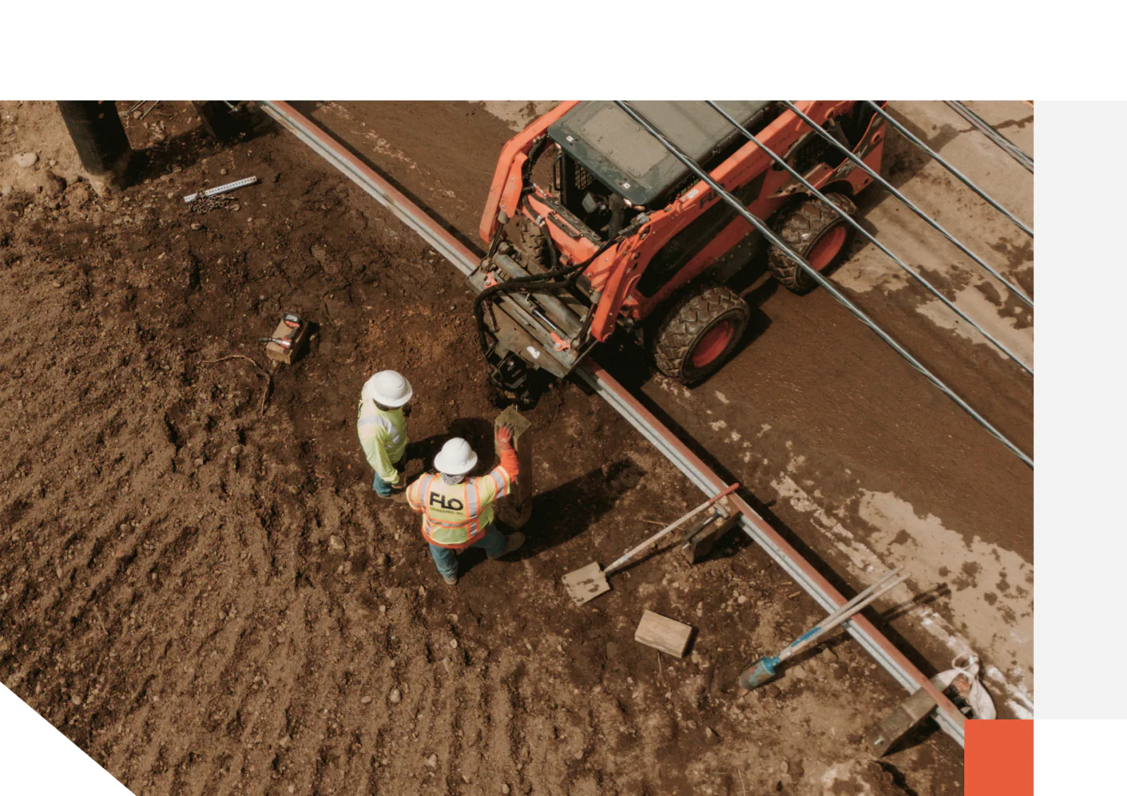 Crew and excavator carrying out emergency earthwork